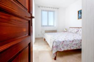 Postel nebo postele na pokoji v ubytování Guesthouse Santin
