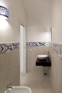 Ett badrum på amaMì home