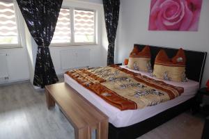 Кровать или кровати в номере Stralsunder