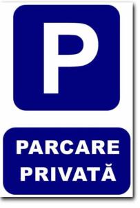 a blue parking sign with the words p parrecaria at Summerland apartments and Alezzi apartments in Mamaia