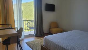 Postel nebo postele na pokoji v ubytování Theoxenia Hotel