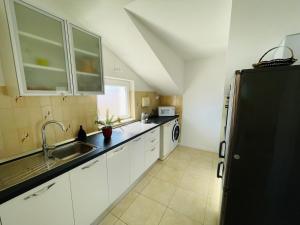 Кухня или мини-кухня в Apartman Luka
 +5 фотографий