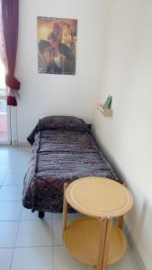 Postel nebo postele na pokoji v ubytování La Casa di Monica