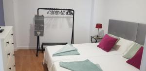 Posteľ alebo postele v izbe v ubytovaní Apartamento cerca de la Playa de Las Canteras