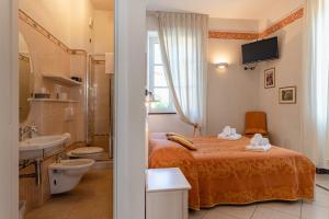 Letto o letti in una camera di Lucca Franco's Villa