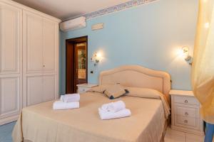 Letto o letti in una camera di Lucca Franco's Villa