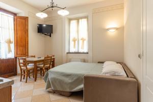 Letto o letti in una camera di Lucca Franco's Villa