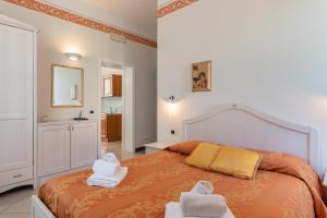 Letto o letti in una camera di Lucca Franco's Villa