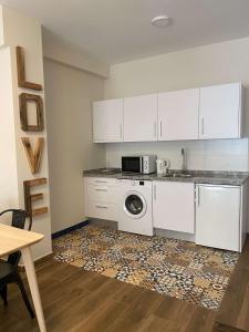 Küche/Küchenzeile in der Unterkunft Apartamentos San Miguel