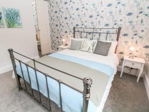 Ένα ή περισσότερα κρεβάτια σε δωμάτιο στο Appletree Cottage