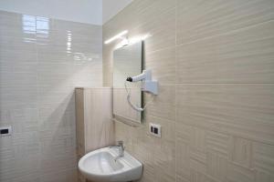 Koupelna v ubytování B&B Carmelina + 59 fotografií