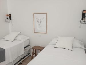 Кровать или кровати в номере Ripera Panticosa