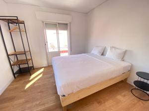 Postel nebo postele na pokoji v ubytování Delta Apartment
