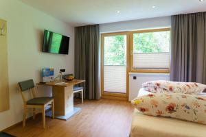 TV o dispositivi per l'intrattenimento presso Hotel Alpenfrieden