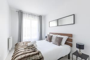 Posteľ alebo postele v izbe v ubytovaní La Canopée By Plaza + 14 fotografií