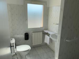 Ванна кімната в hôtel de la grange