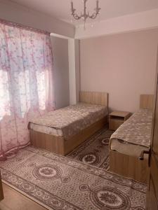 Postel nebo postele na pokoji v ubytování Берег + 70 fotografií