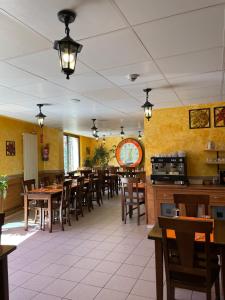 Restoranas ar kita vieta pavalgyti apgyvendinimo įstaigoje Hotel Cims Pas de La Casa