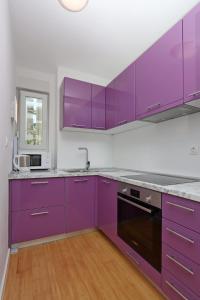 Kuchyň nebo kuchyňský kout v ubytování Apartments Novalja West