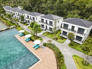 an aerial view of a house with a swimming pool at DAD Resort Phú Quốc in Phú Quốc