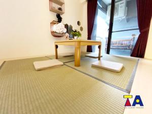 Letto o letti in una camera di Ta 溫泉會館