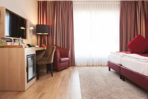 Kuchyň nebo kuchyňský kout v ubytování Weinhotel Kaisergarten