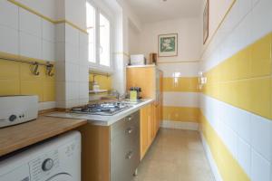 A kitchen or kitchenette at Santonofrio SKY Terrace Penthouse