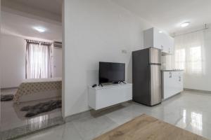 Kuchyň nebo kuchyňský kout v ubytování Apartmani Dodig