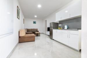 Kuchyň nebo kuchyňský kout v ubytování Apartmani Dodig + 35 fotografií