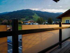 a balcony with a view of a mountain at Ottl's Appartement O2 in Sankt Lorenzen ob Murau