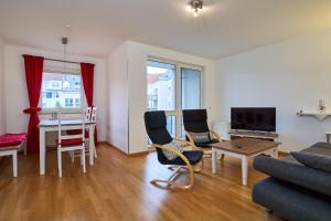 A seating area at Apartment Sun Balcony Dresden Friedrichstadt