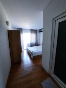 Postel nebo postele na pokoji v ubytování VILA SAMI