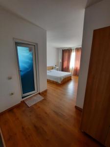 Postel nebo postele na pokoji v ubytování VILA SAMI
