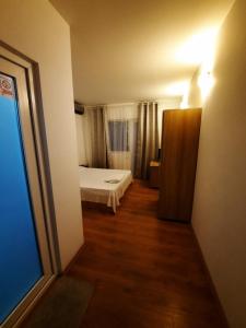 Postel nebo postele na pokoji v ubytování VILA SAMI