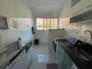 Кухня или мини-кухня в Apartamento em Vila Velha, Itaparica
