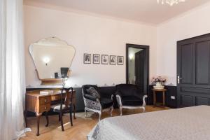Postel nebo postele na pokoji v ubytování La casa di Gatsby Art Deco in Centro Gorizia con Parcheggio e Terrazza