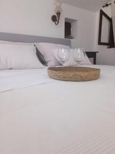 Postel nebo postele na pokoji v ubytování Apartments Hortenzija