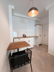 A kitchen or kitchenette at Amber Boutique Hotel