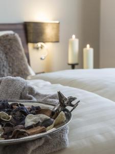 Una cama o camas en una habitación de Hotel Cervo