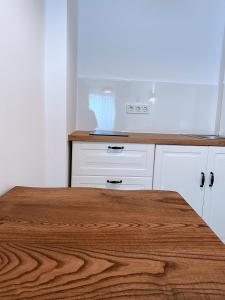 A kitchen or kitchenette at Amber Boutique Hotel