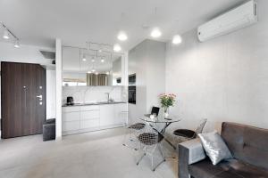 Kuchyňa alebo kuchynka v ubytovaní Mennica Residence Luxury Location