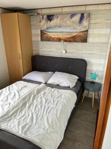 Postel nebo postele na pokoji v ubytování Chalet Meerblick Wattenmeer