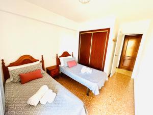 Posteľ alebo postele v izbe v ubytovaní Mariscal Apartment + 5 fotografií