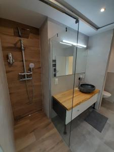 Ванная комната в Haus EDDA - Ferienwohnungen mit Garten und Schlossblick