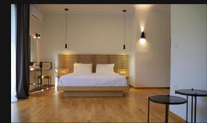 Postel nebo postele na pokoji v ubytování Theoxenia Hotel