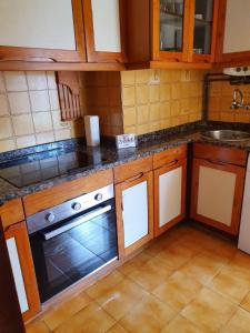 Kuchyň nebo kuchyňský kout v ubytování Bonito apartamento cerca de las playas + 11 fotografií