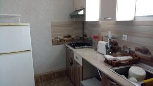 Guest House DODU tesisinde mutfak veya mini mutfak