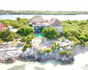 an aerial view of a resort on an island in the water at Casa Coco by Coco B Isla in Isla Mujeres