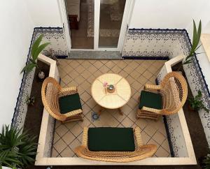 an overhead view of a patio with a table and chairs at Casa Almendro in Jumilla