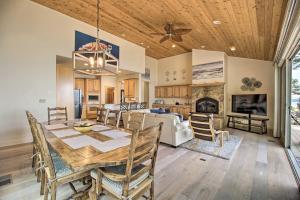 a dining room and living room with a table and chairs at Oceanfront Point Arena House with Lovely Deck! in Point Arena +44 photos